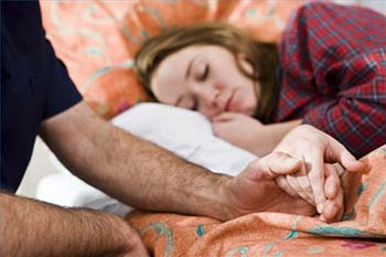 Man holding women's hand